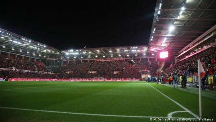 The interior of the stadium of Bundesliga club 1. FSV Mainz 05 is illuminated by a new LED lighting system during an evening game