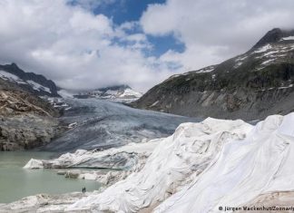 The ozone hole is shrinking Knowledge & Environment | DW Rhone Glacier near Oberwald in Valais partially covered with white tarps