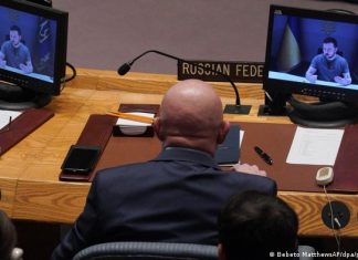 Ukraine update: Kyiv calls on West to step up military aid | Current World | DW Russian Ambassador to the UN Vasily Nebenzya listens to Volodymyr Zelenskyy's speech