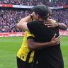 Cologne coach Steffen Baumgart (right) hugs BVB striker Anthony Modeste (left) before the game 1. FC Cologne - Borussia Dortmund