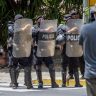 Nicaragua, Managua |  Police forces block a street