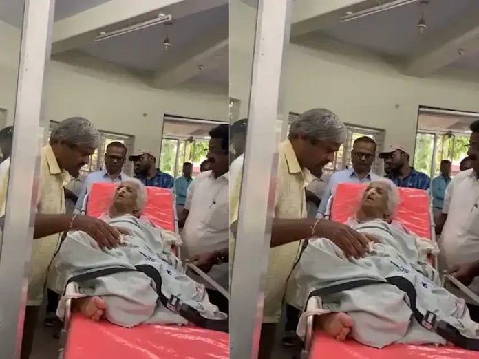 Old lady brought to the Deputy Registrar's office in Belgaum with ICU bed for signature

