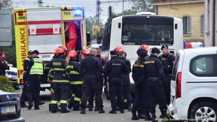 Rescue workers and police at the scene of the accident